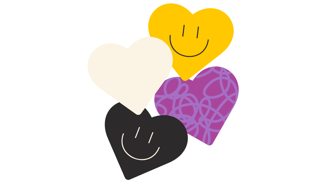 Four colorful hearts with smiley faces on a white background